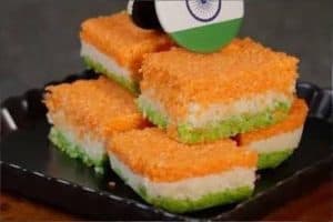 Tiranga Coconut Barfi: स्वतंत्रता दिवस पर बनाएं बाजार जैसी मिलावट से मुक्त स्वादिष्ट तिरंगा कोकोनट बर्फी। जानिए ताजे नारियल और प्राकृतिक रंगों से घर पर यह हेल्दी तिरंगा बर्फी बनाने की आसान रेसिपी।