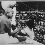 International Day of Non-Violence 2025: Honouring Mahatma Gandhi’s Legacy Globally (Photo: Mahatma Gandhi attending a prayer meeting at Gandhi Maidan, 1946 / PIB)